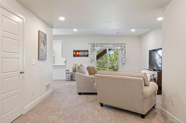 20855 Park Hollow Dr, Parker, CO 80138 - living room featuring light colored carpet, recessed lighting, and baseboards