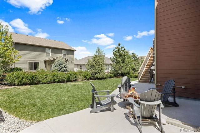 20855 Park Hollow Dr, Parker, CO 80138 - view of patio featuring a fire pit and stairway