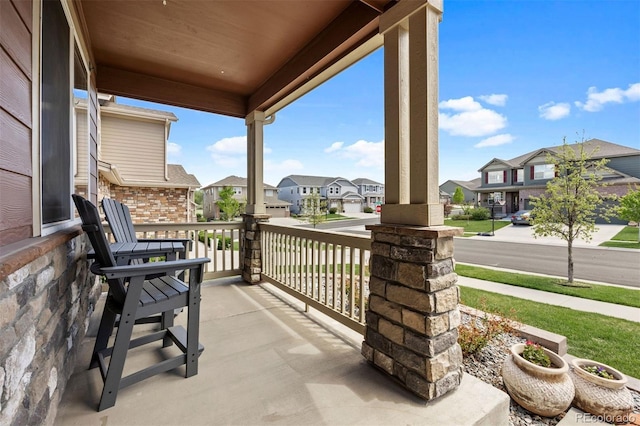 20855 Park Hollow Dr, Parker, CO 80138 - covered porch featuring a residential view