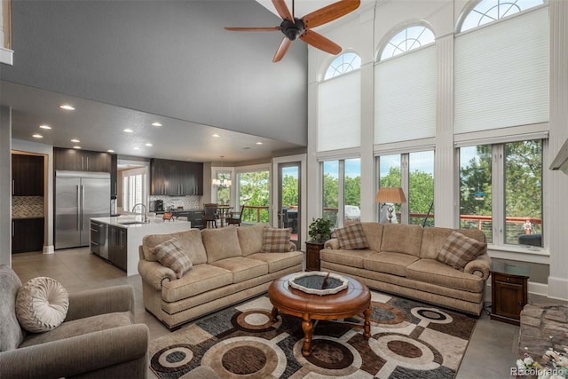 171 October Pl, Castle Rock, CO 80104 - living room with a towering ceiling, healthy amount of natural light, ceiling fan, and recessed lighting