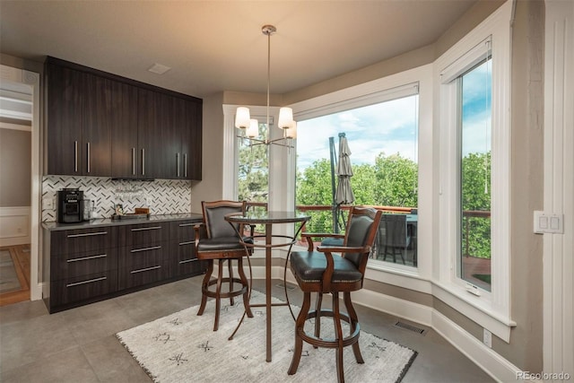 171 October Pl, Castle Rock, CO 80104 - dining room with plenty of natural light and a chandelier