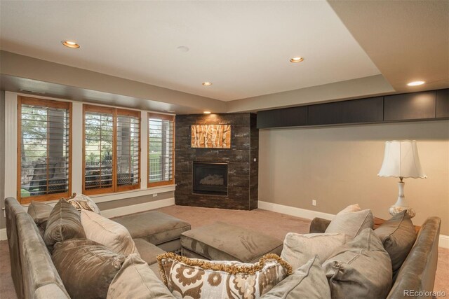 171 October Pl, Castle Rock, CO 80104 - living area with carpet floors, recessed lighting, a fireplace, and plenty of natural light