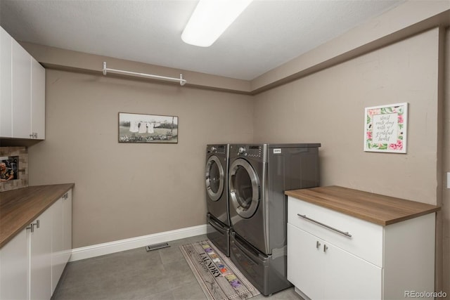 171 October Pl, Castle Rock, CO 80104 - laundry area featuring cabinet space and independent washer and dryer