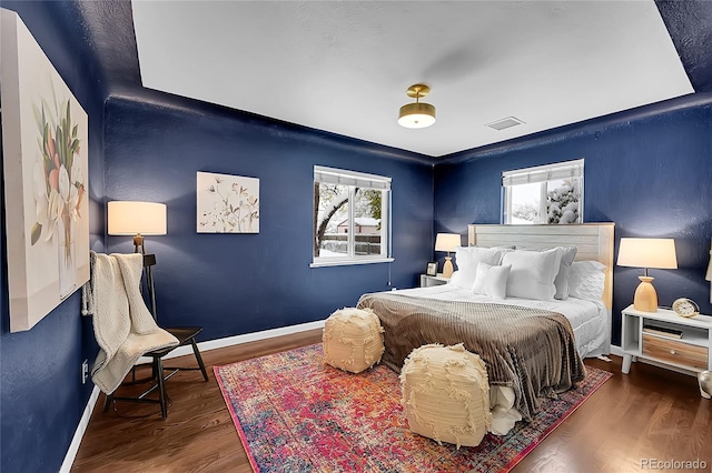 bedroom featuring dark hardwood / wood-style floors