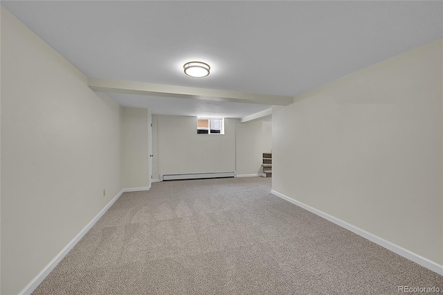 basement with a baseboard radiator and carpet floors