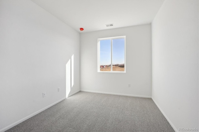 empty room with carpet floors