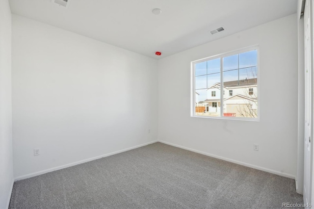 unfurnished room featuring carpet floors