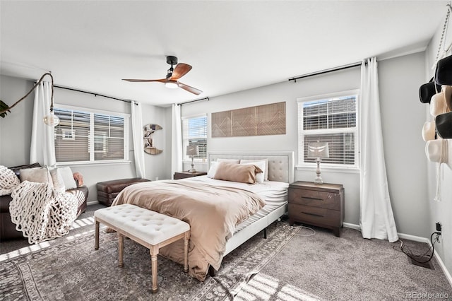 bedroom featuring cooling unit, ceiling fan, and carpet floors