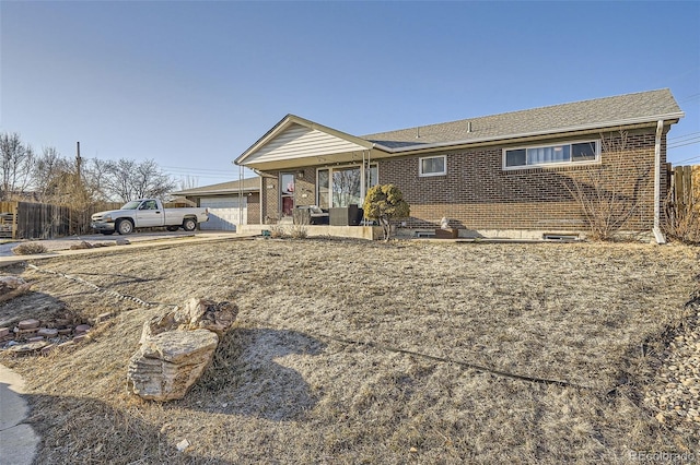 ranch-style house featuring a garage