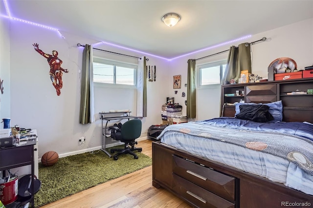 bedroom featuring hardwood / wood-style floors