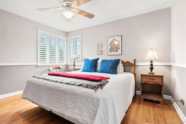 1030 Krameria St, Denver, CO 80220 - bedroom featuring wood finished floors, baseboards, and ceiling fan