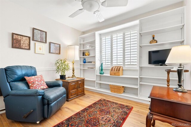 1030 Krameria St, Denver, CO 80220 - sitting room featuring wood finished floors and ceiling fan