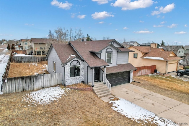 view of front of property featuring a garage