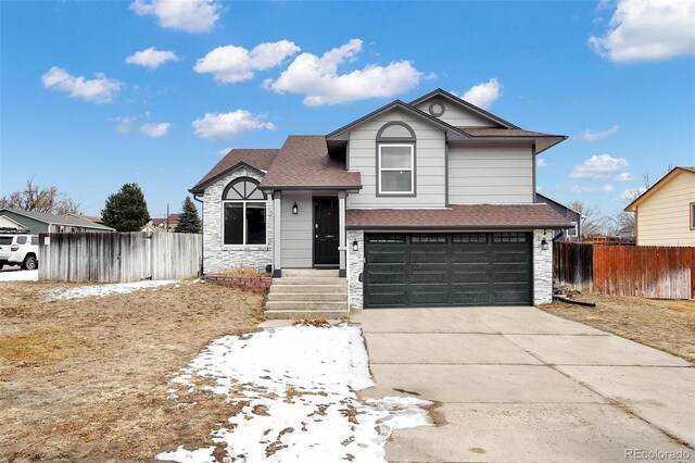 view of front of property with a garage