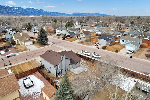 birds eye view of property featuring a mountain view