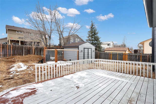 deck featuring a shed