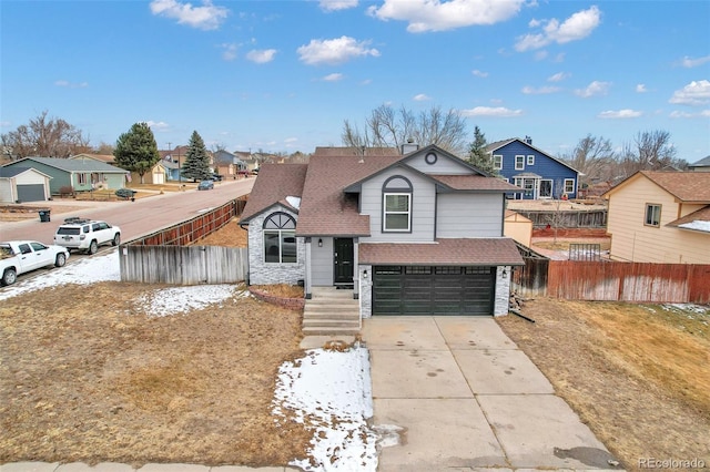 view of front of home with a garage