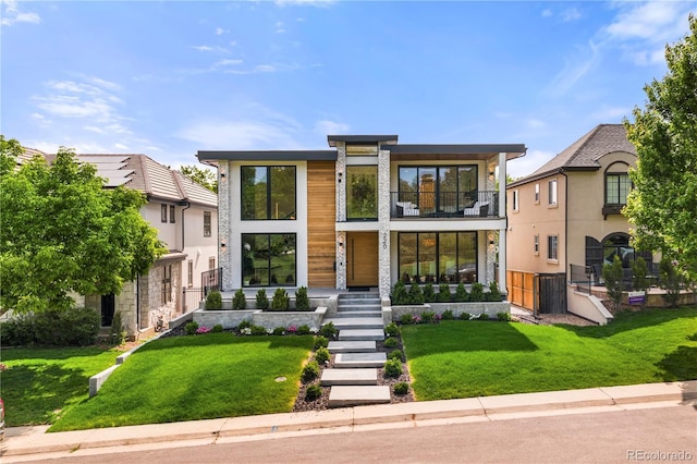 220 Glencoe St, Denver, CO 80220 - modern home featuring a balcony and a front yard
