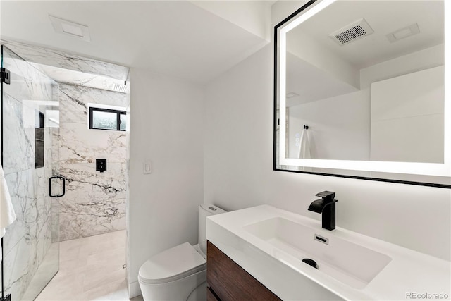 220 Glencoe St, Denver, CO 80220 - bathroom featuring vanity, a marble finish shower, and toilet