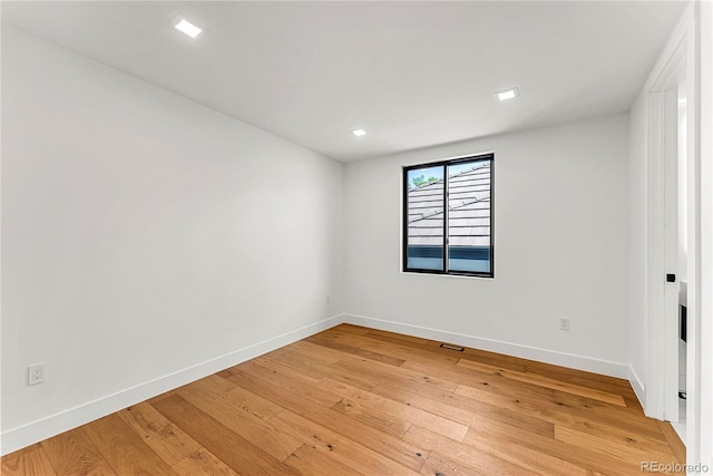 220 Glencoe St, Denver, CO 80220 - spare room featuring light wood finished floors, baseboards, and recessed lighting