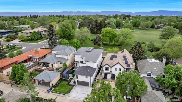 220 Glencoe St, Denver, CO 80220 - aerial perspective of suburban area featuring a mountain backdrop