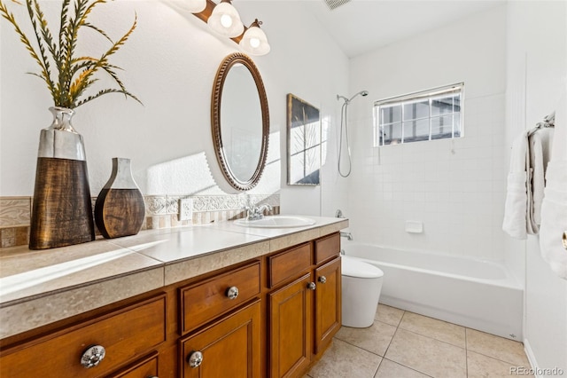 bathroom with vanity, visible vents, tile patterned floors, toilet, and shower / bathtub combination