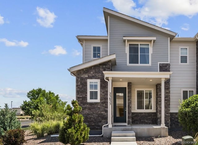 23633 E 5th Dr, Aurora, CO 80018 - view of front of house featuring stone siding