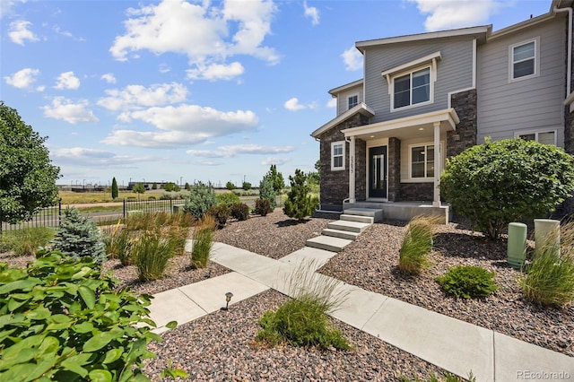 23633 E 5th Dr, Aurora, CO 80018 - view of front of home featuring stone siding