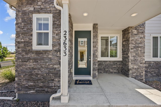 23633 E 5th Dr, Aurora, CO 80018 - property entrance with stone siding