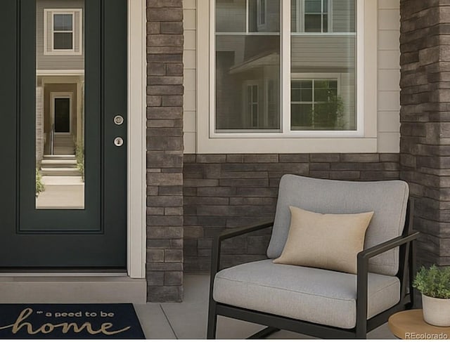 23633 E 5th Dr, Aurora, CO 80018 - view of exterior entry featuring stone siding