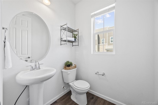 23633 E 5th Dr, Aurora, CO 80018 - bathroom featuring baseboards and wood finished floors
