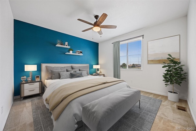 23633 E 5th Dr, Aurora, CO 80018 - carpeted bedroom with a ceiling fan and baseboards