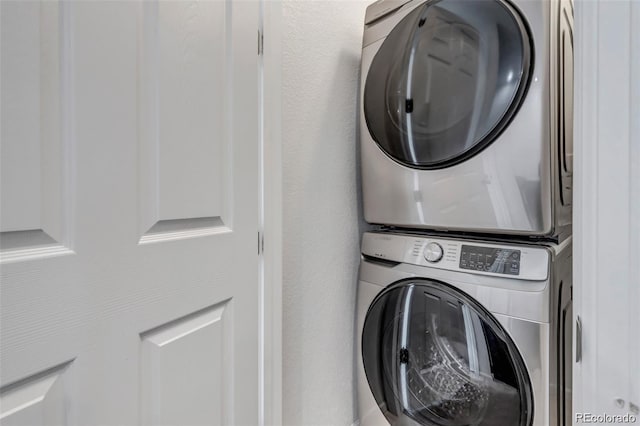 23633 E 5th Dr, Aurora, CO 80018 - washroom featuring estacked washer and dryer
