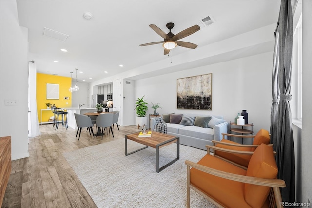23633 E 5th Dr, Aurora, CO 80018 - living room featuring light wood-style flooring, recessed lighting, and ceiling fan