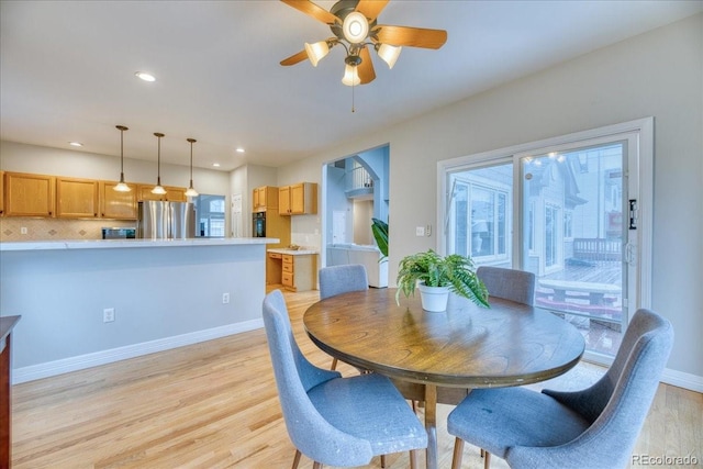 58 Rogers Ct, Golden, CO 80401 - dining space featuring light wood-style flooring, a ceiling fan, baseboards, and recessed lighting