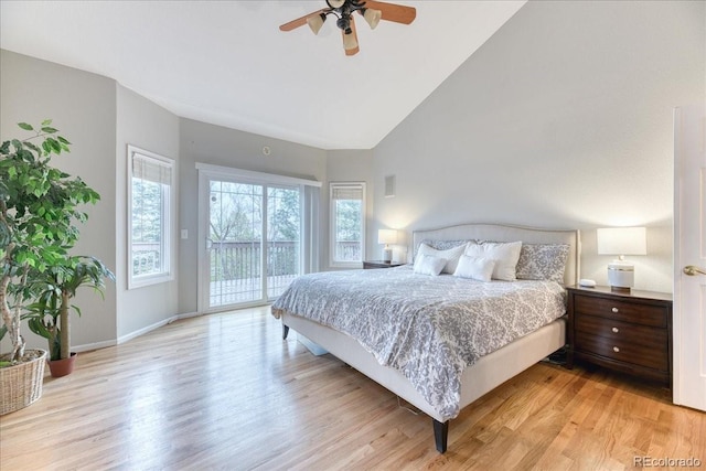 58 Rogers Ct, Golden, CO 80401 - bedroom with access to exterior, light wood finished floors, baseboards, high vaulted ceiling, and a ceiling fan