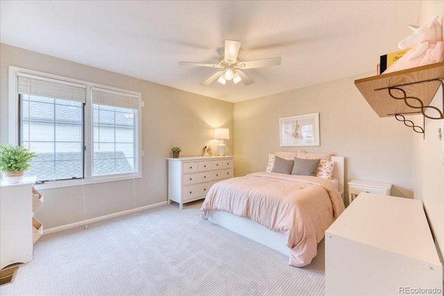 58 Rogers Ct, Golden, CO 80401 - bedroom featuring light carpet, baseboards, and a ceiling fan