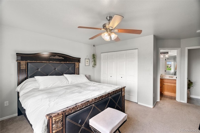 8617 W 17th Street Dr, Greeley, CO 80634 - bedroom featuring carpet flooring, a closet, baseboards, and a ceiling fan