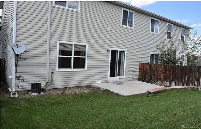 5546 S Quemoy Cir, Aurora, CO 80015 - rear view of house with cooling unit