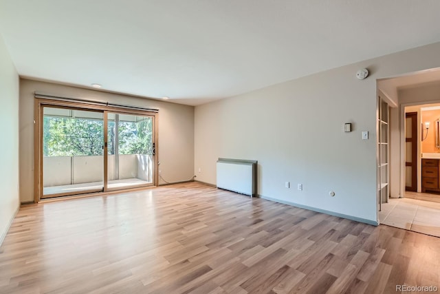 empty room featuring light hardwood / wood-style floors