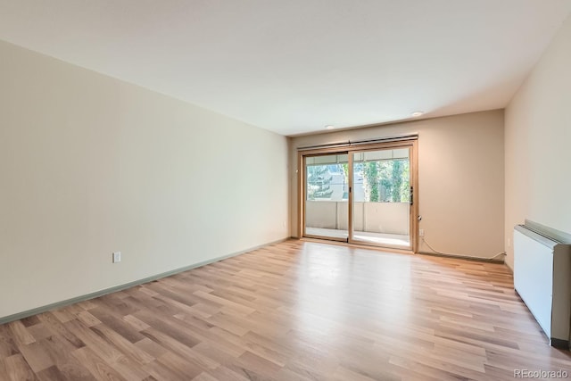 empty room featuring light hardwood / wood-style floors