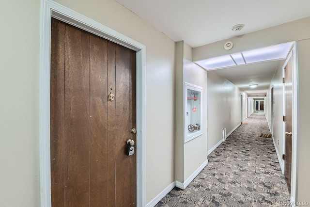 corridor with carpet floors