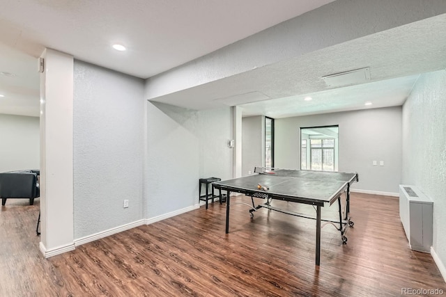 recreation room featuring wood-type flooring