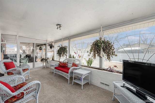 sunroom / solarium with visible vents