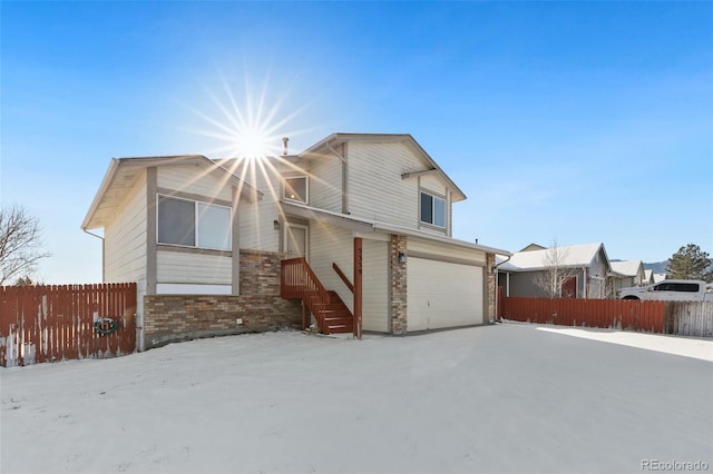 view of front of home with a garage