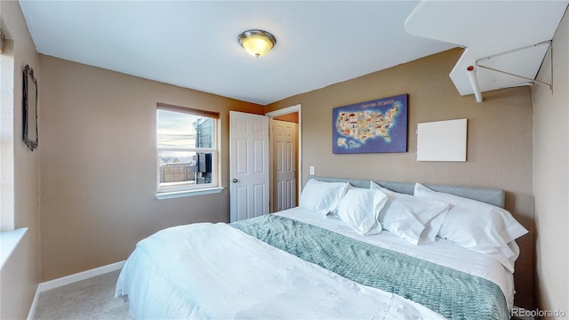 bedroom featuring carpet flooring