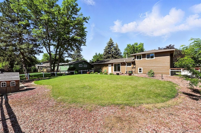 1380 Holly Dr E, Broomfield, CO 80020 - view of yard with a shed
