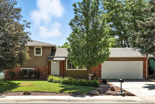 1380 Holly Dr E, Broomfield, CO 80020 - tri-level home featuring brick siding, an attached garage, a front lawn, and concrete driveway
