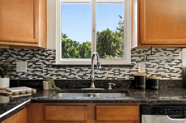 1380 Holly Dr E, Broomfield, CO 80020 - kitchen featuring stainless steel dishwasher, decorative backsplash, and brown cabinetry