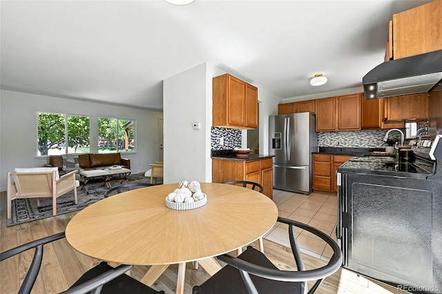1380 Holly Dr E, Broomfield, CO 80020 - dining space with light wood-style flooring
